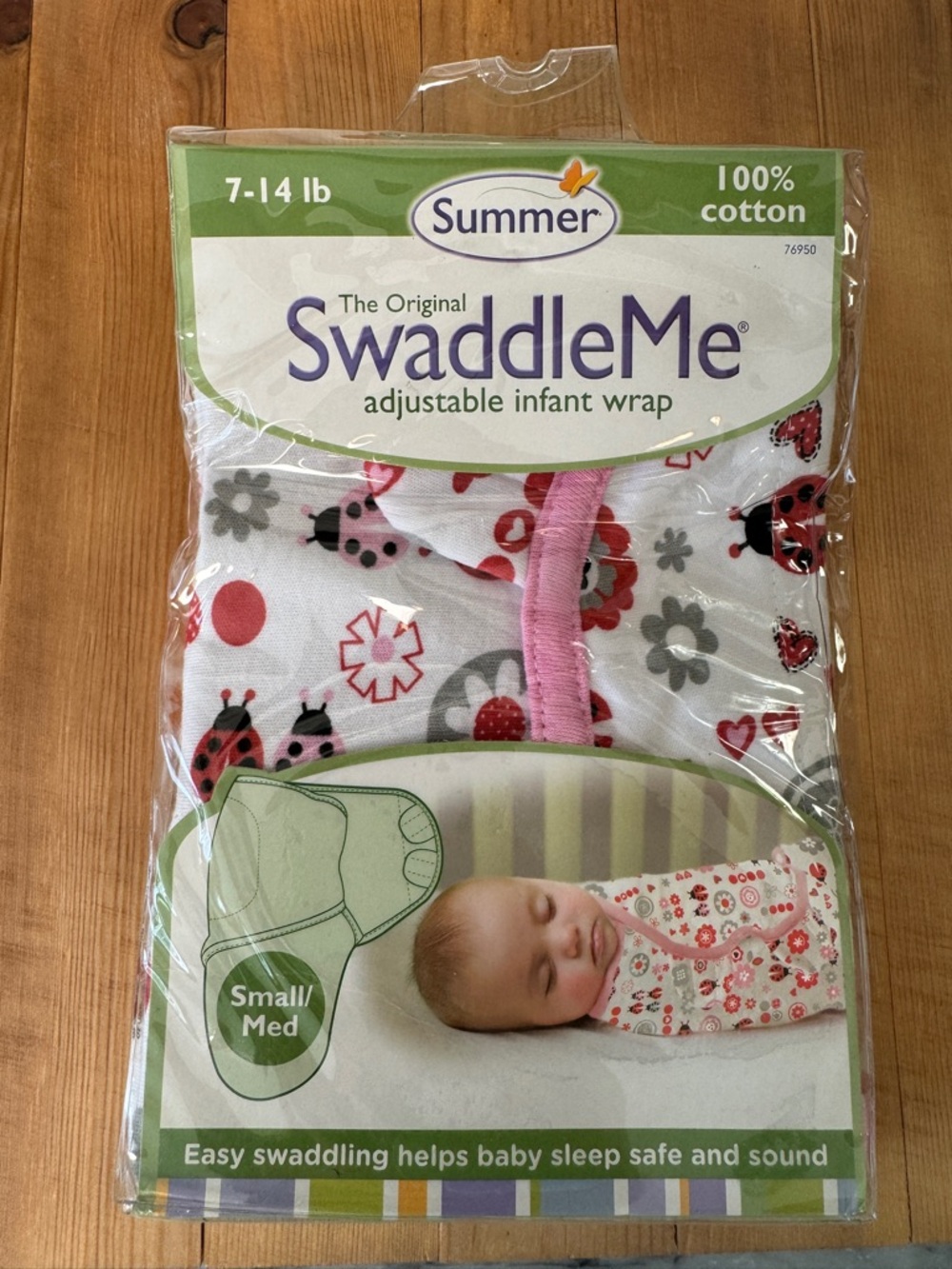 SwaddleMe Infant Wrap Packaging - White with Green Trim